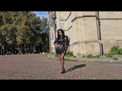 fall outfit outdoor with a beautiful scenery city gates and old churches