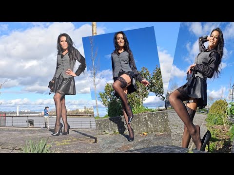Grey and black color combinations black stockings and hightheels shoes[river side view]