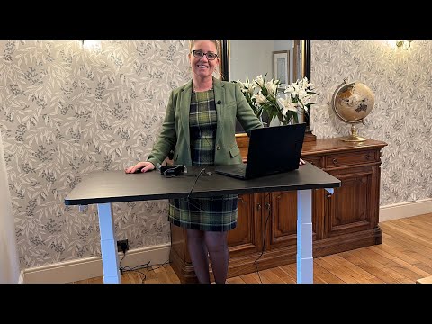 I’m reviewing the FlexiSpot adjustable desk in Hobbs Suit Dune Heels and Wolford Tights Office Wear