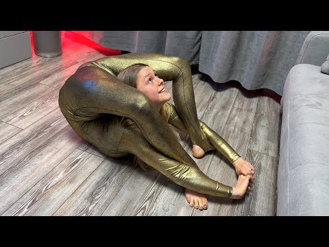 Contortion at Home in Gold Catsuit. Morning Stretching Circus Artist. Flexshow