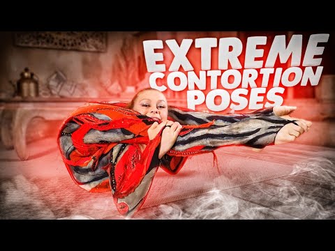 Extreme contortion poses. Flexible circus girl stretching. Flexshow.