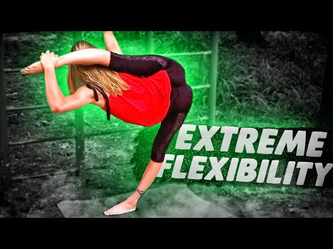 Extreme flexibility. Contortion training. Circus girl Julia does stretching outdoors. Flexshow.