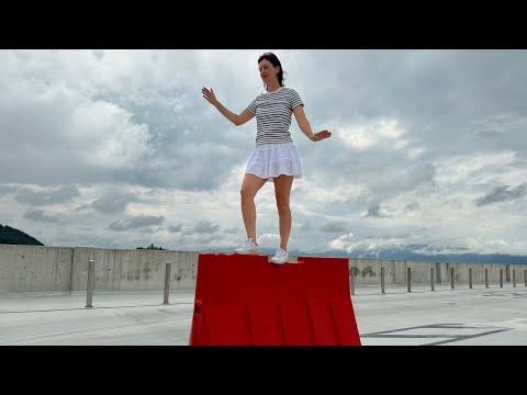 Girl Walking on a Roof with an Umbrella – Unreal Gravity-Defying Moment!