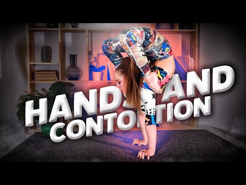 Handstand contortion. Stretching routines in photo studio. Circus performer. Flexshow
