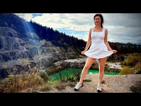 Simple Village Day: A girl walks through an abandoned quarry in nature